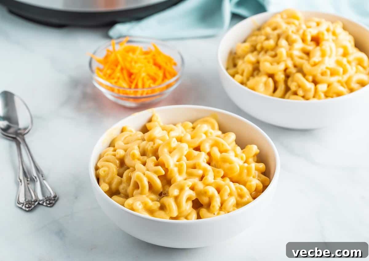 Creamy Instant Pot Mac and Cheese 5 two bowls of macaroni and cheese