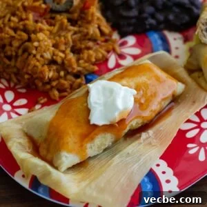 Shredded Beef Tamales with Red Chile Sauce 6 A homemade tamale on a dinner plate.