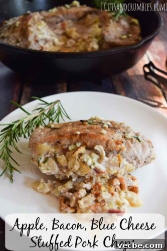 Apple, Bacon and Blue Cheese Stuffed Pork Chops Recipe 2 apple bacon blue cheese stuffed pork chops on white plate with sprig of rosemary and title