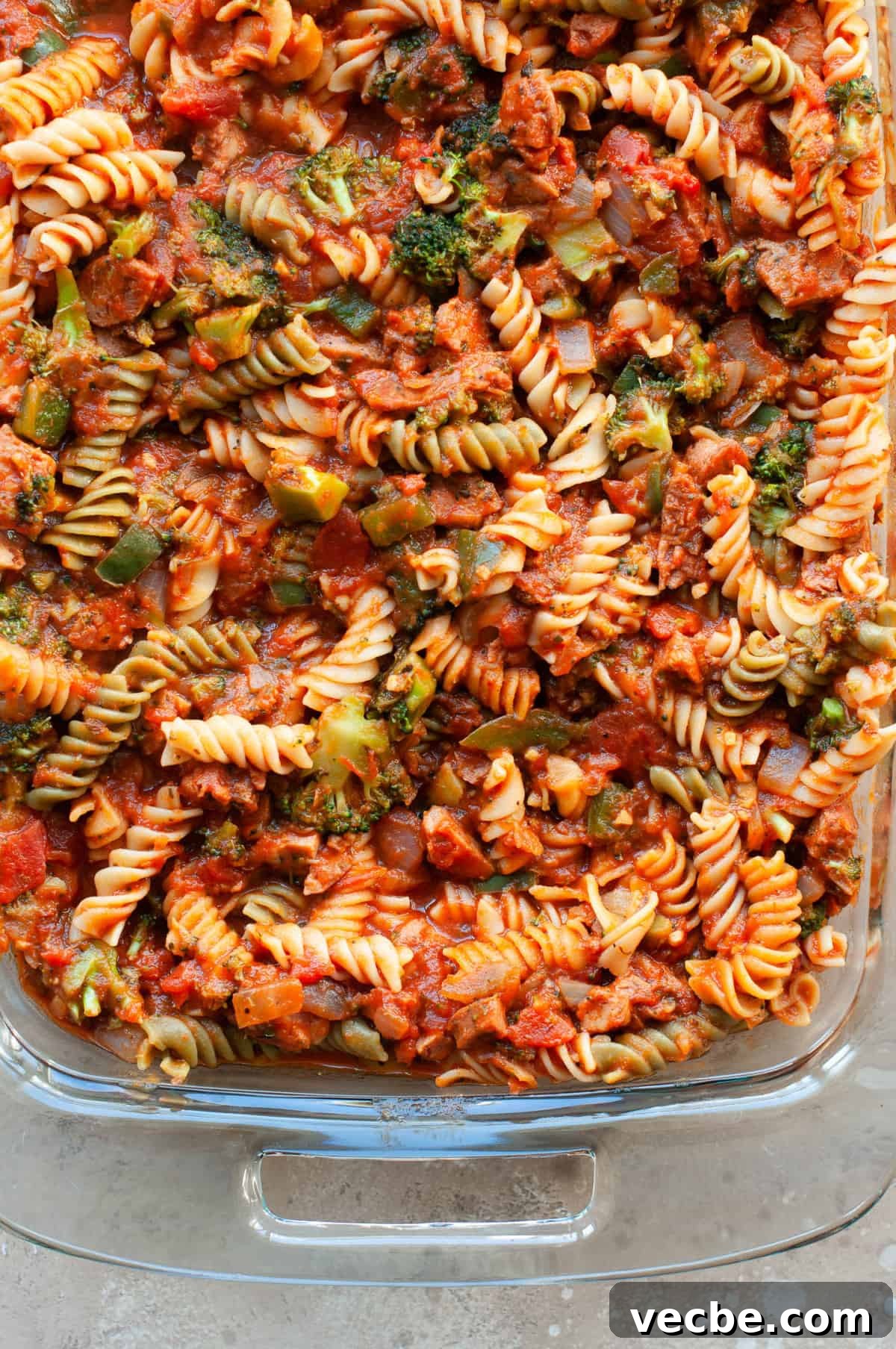 One-Pan Cheesy Pizza Casserole Recipe with Pepperoni 4 making healthy pizza casserole