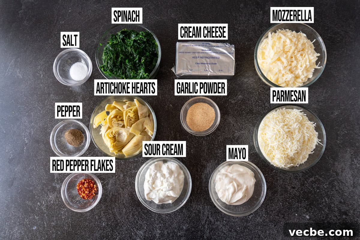 Creamy Hot Artichoke Dip Recipe 3 hot artichoke dip ingredients in individual bowls and labeled.