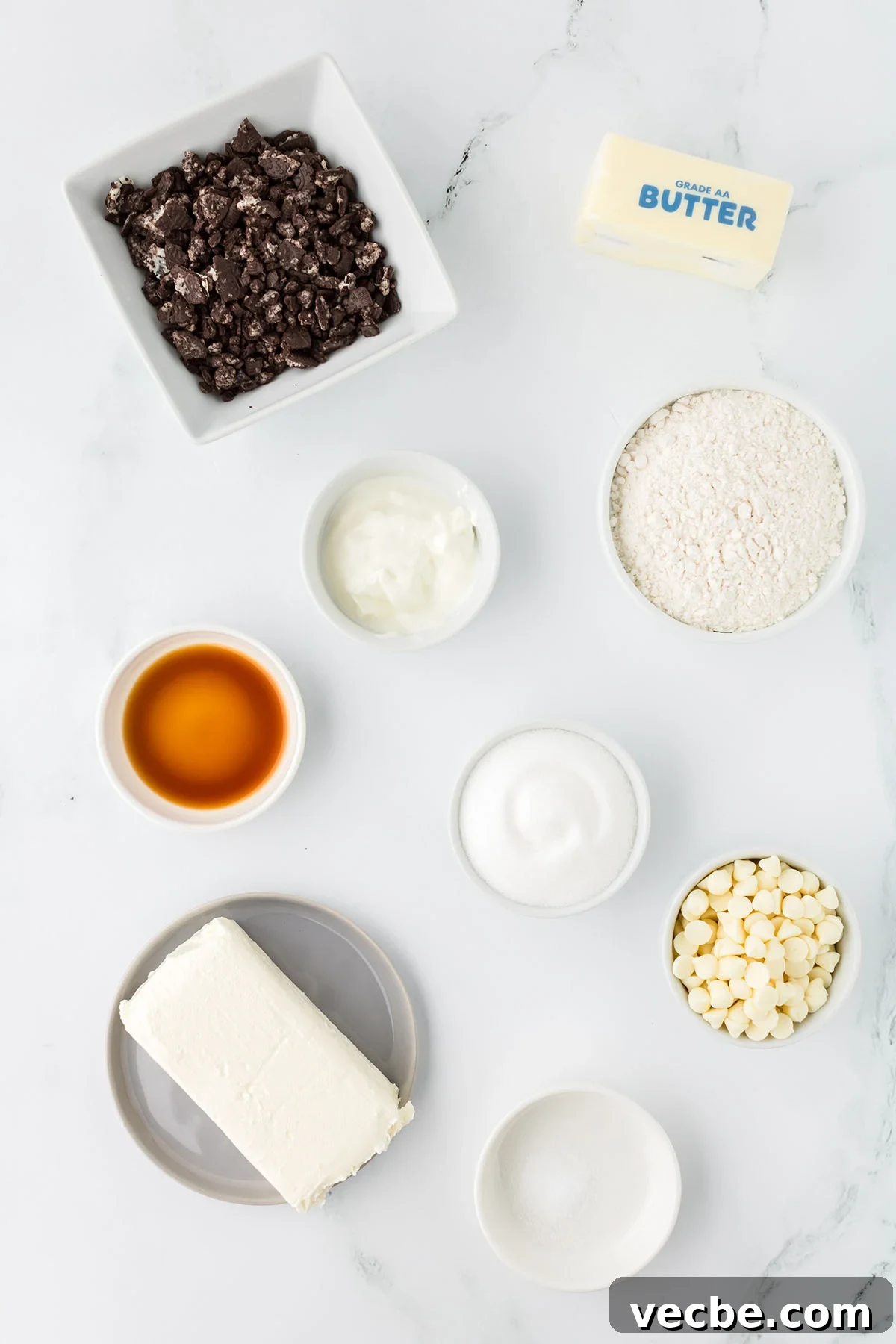 Cookies and Cream Cheesecake Cookie Bites 3 Ingredients to make Cookies are set out on the counter.