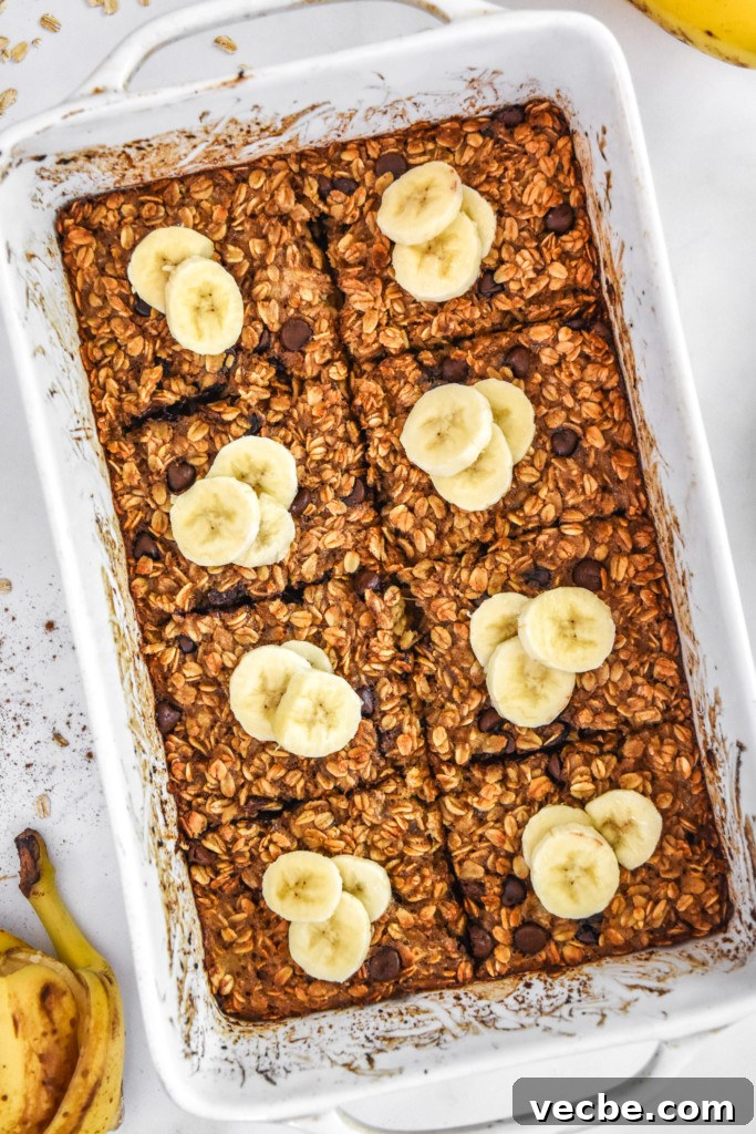 Chocolate Chip Banana Bread Baked Oatmeal Recipe 2 chocolate chip banana bread baked oatmeal fresh baked in a white casserole dish.