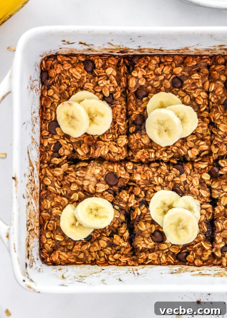 Chocolate Chip Banana Bread Baked Oatmeal Recipe 8 chocolate chip banana bread baked oatmeal fresh baked with sliced bananas on top.
