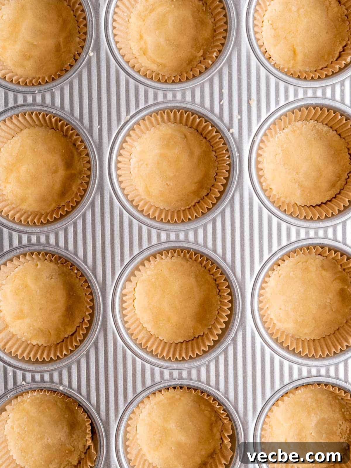 Raspberry Crumble Cookies Better Than Costco 6 Shortbread cookie dough pressed into muffin liners.