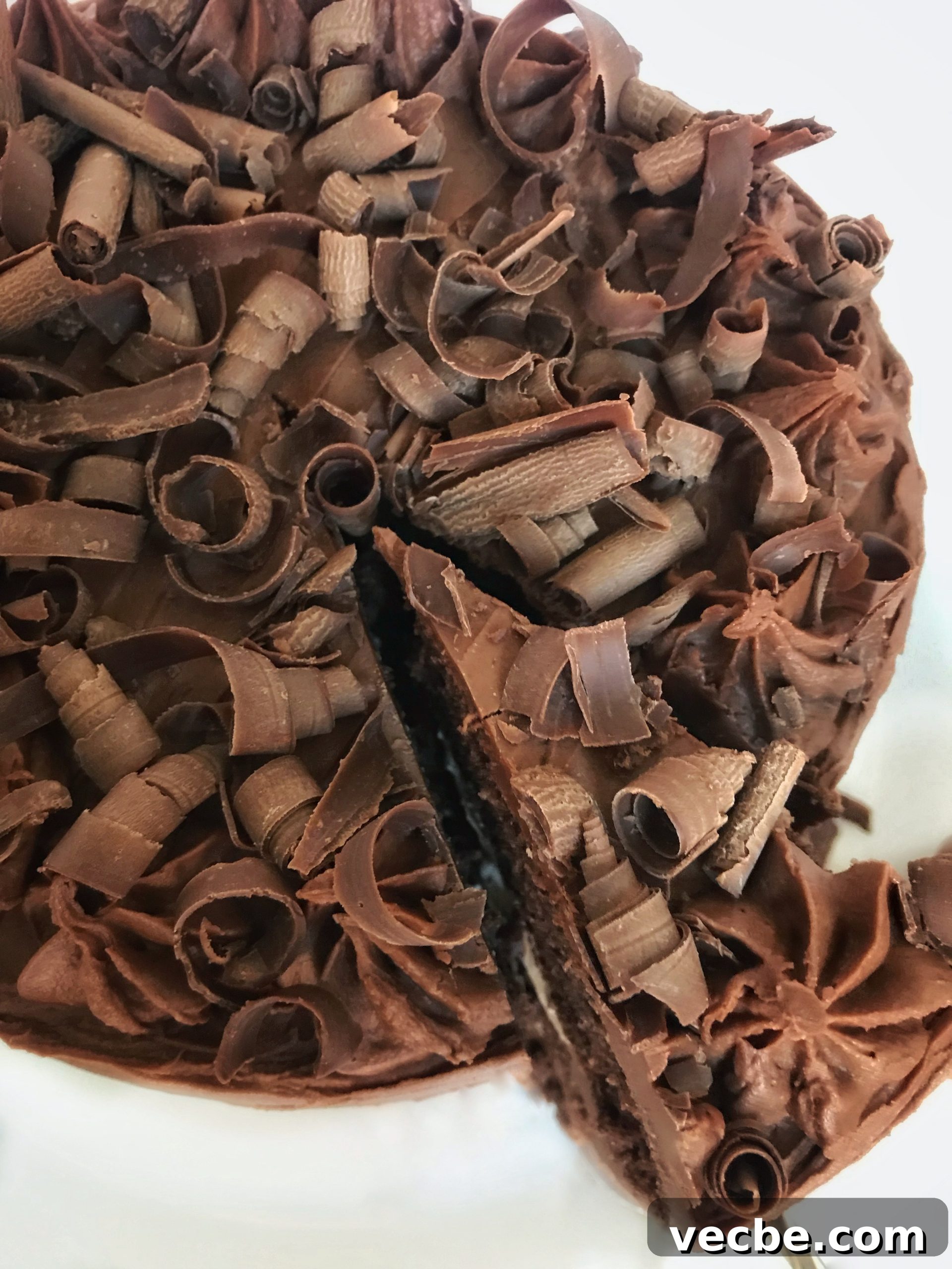 Moist and Decadent Chocolate Cake Recipe 4 thousands of chocolate curls a top chocolate cake