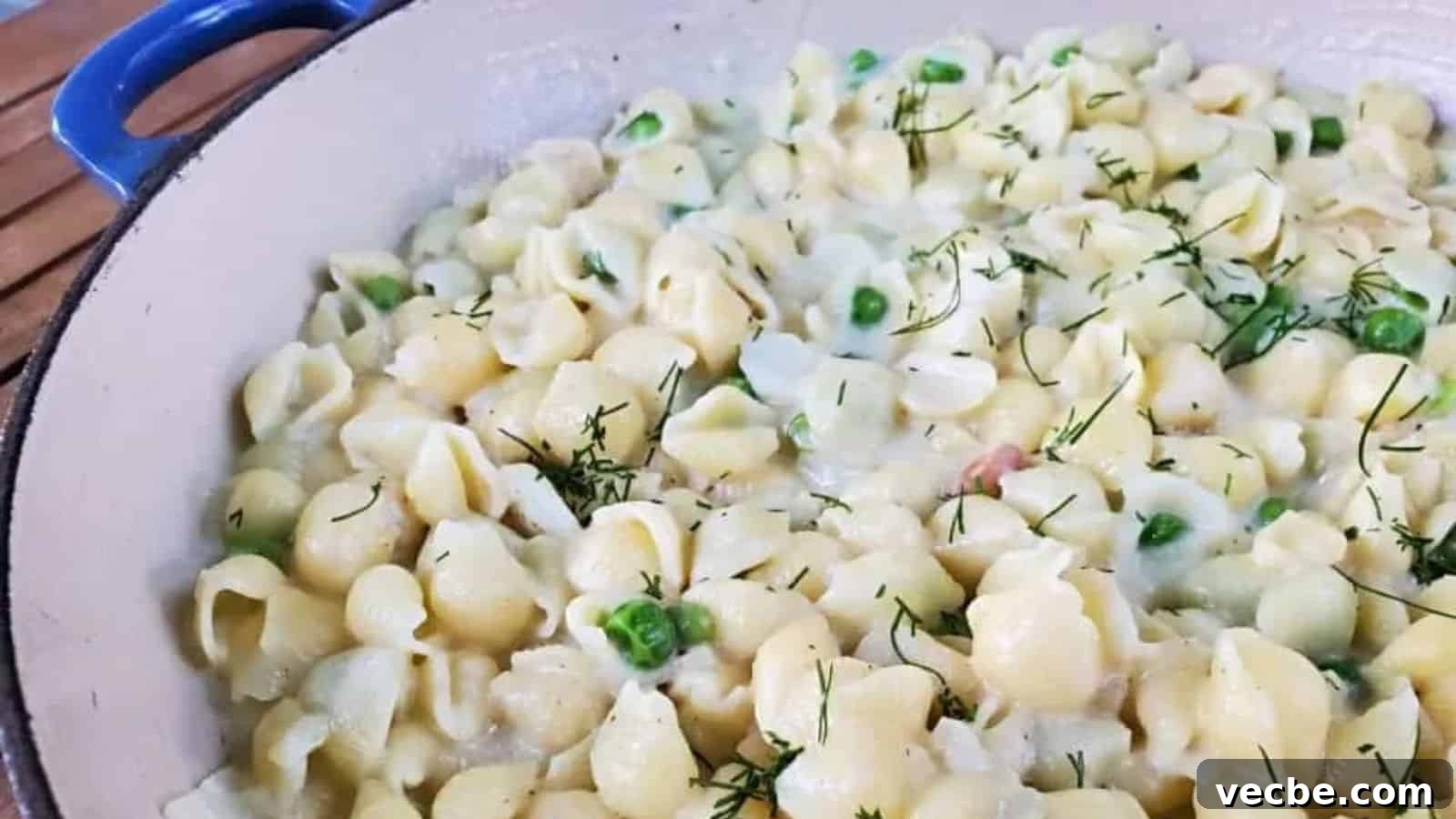 19 Budget-Friendly Meals to Replace Takeout 18 Image shows Creamy Pea Pasta in an enameled cast iron pot.