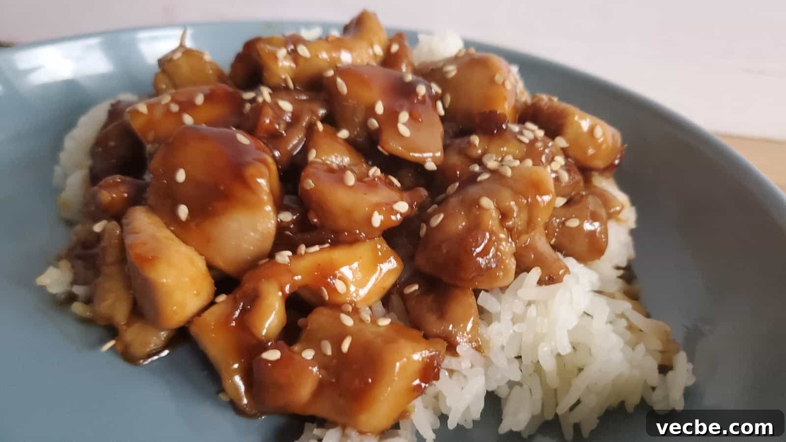 19 Budget-Friendly Meals to Replace Takeout 5 Honey glazed chicken on a blue plate.