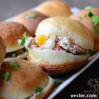A close up of fried bread stuffed with tuna