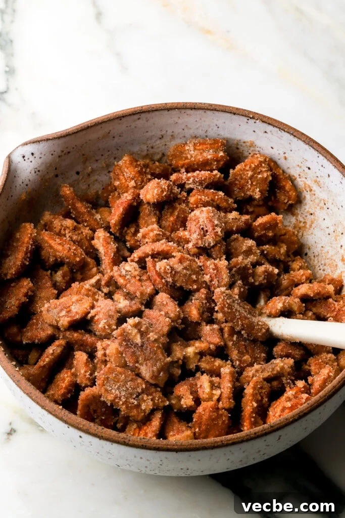 Southern Praline Pecans Recipe 5 cinnamon and sugar added to pecans