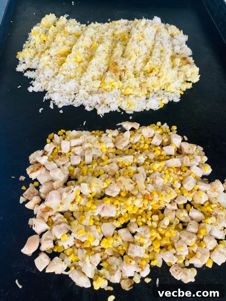 Blackstone Cajun Fried Rice Recipe 5 cooking the rice and veggies on the griddle