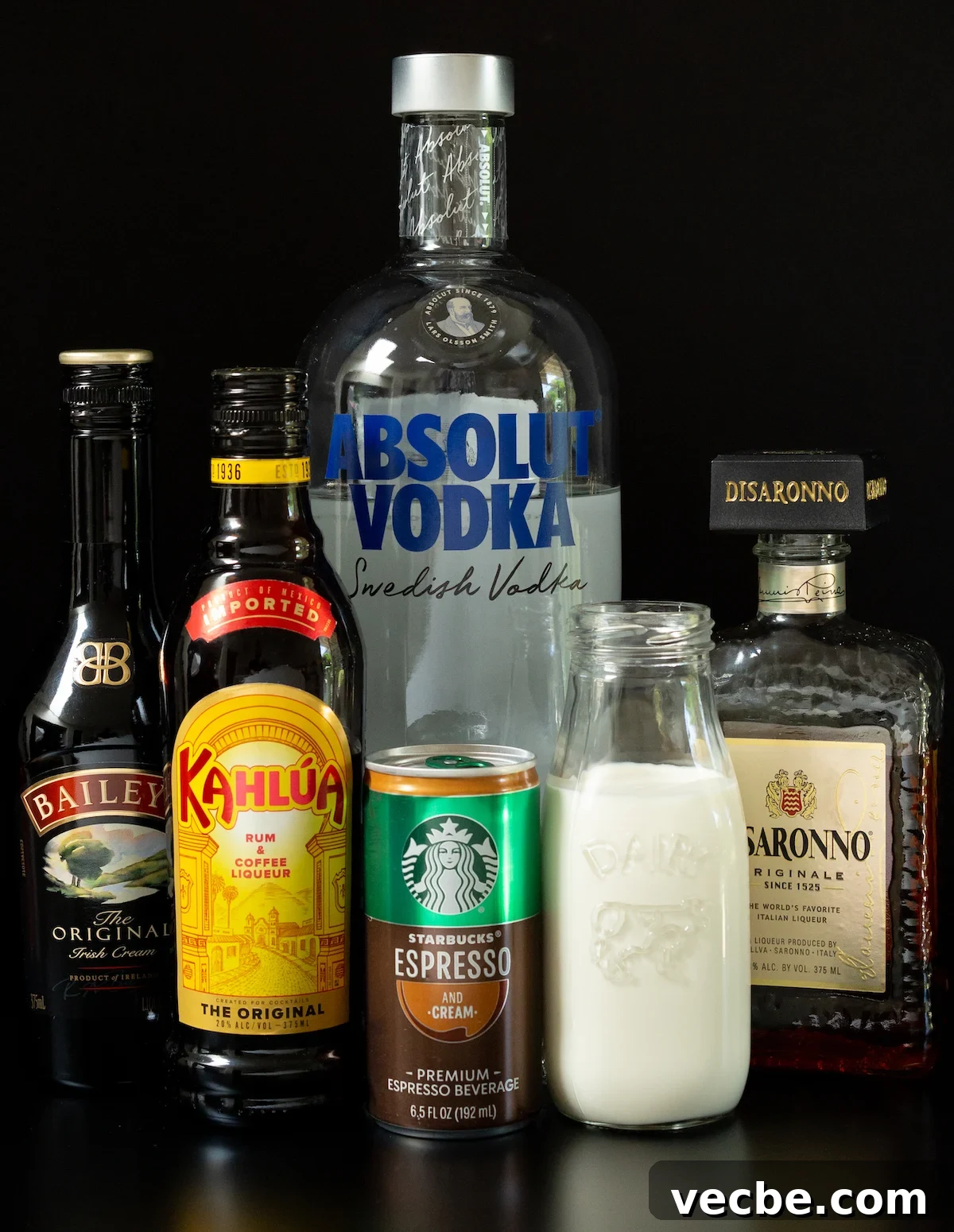 Canned Espresso Martini Cocktail 3 Ingredients for open can espresso martinis including canned espresso, vodka, coffee liqueur, Irish cream, heavy cream, and Disaronno.