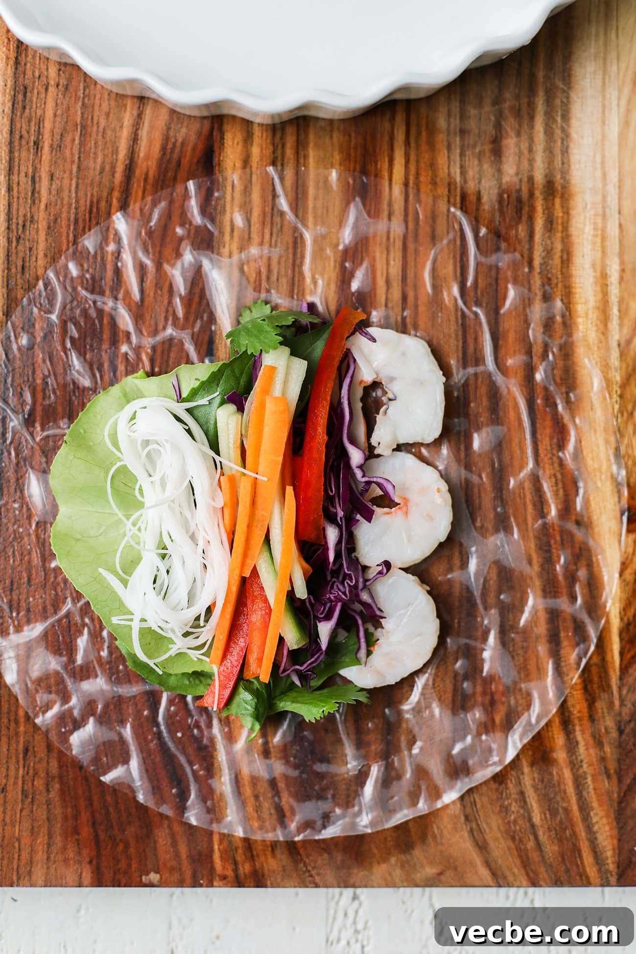 Vietnamese Spring Rolls Recipe with Peanut Dipping Sauce 11 Colorful veggies added into the spring roll filling.