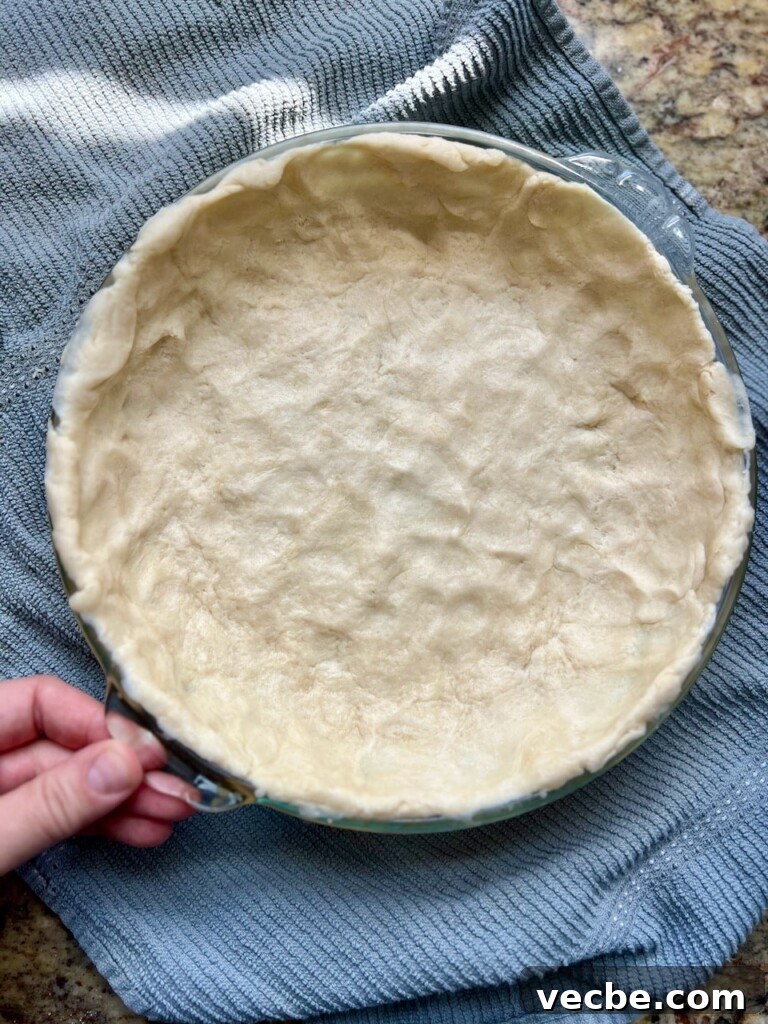 Rustic Sourdough Quiche with Creamy Egg Filling 5 Crust in a pie plate