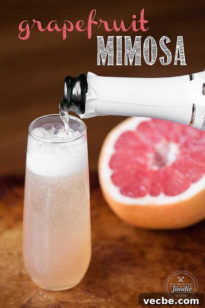 Sparkling Grapefruit Mimosa Recipe for Brunch 2 champagne pouring into a glass with grapefruit juice