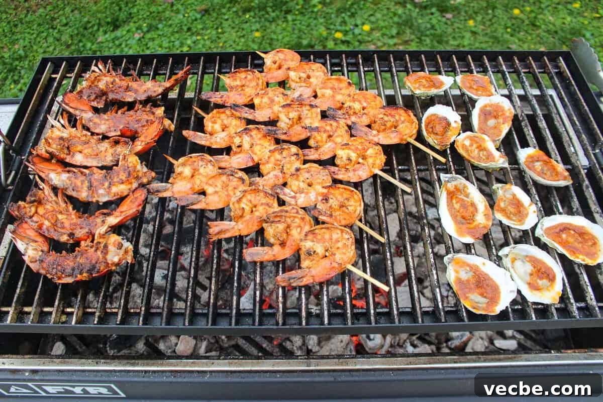 How to Make a Grilled Seafood Platter 5 the lobster tails, shrimp, and oysters are on the grill.