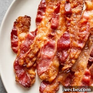 How to Cook Bacon in the Oven for Crispy Strips 6 close-up of oven baked bacon