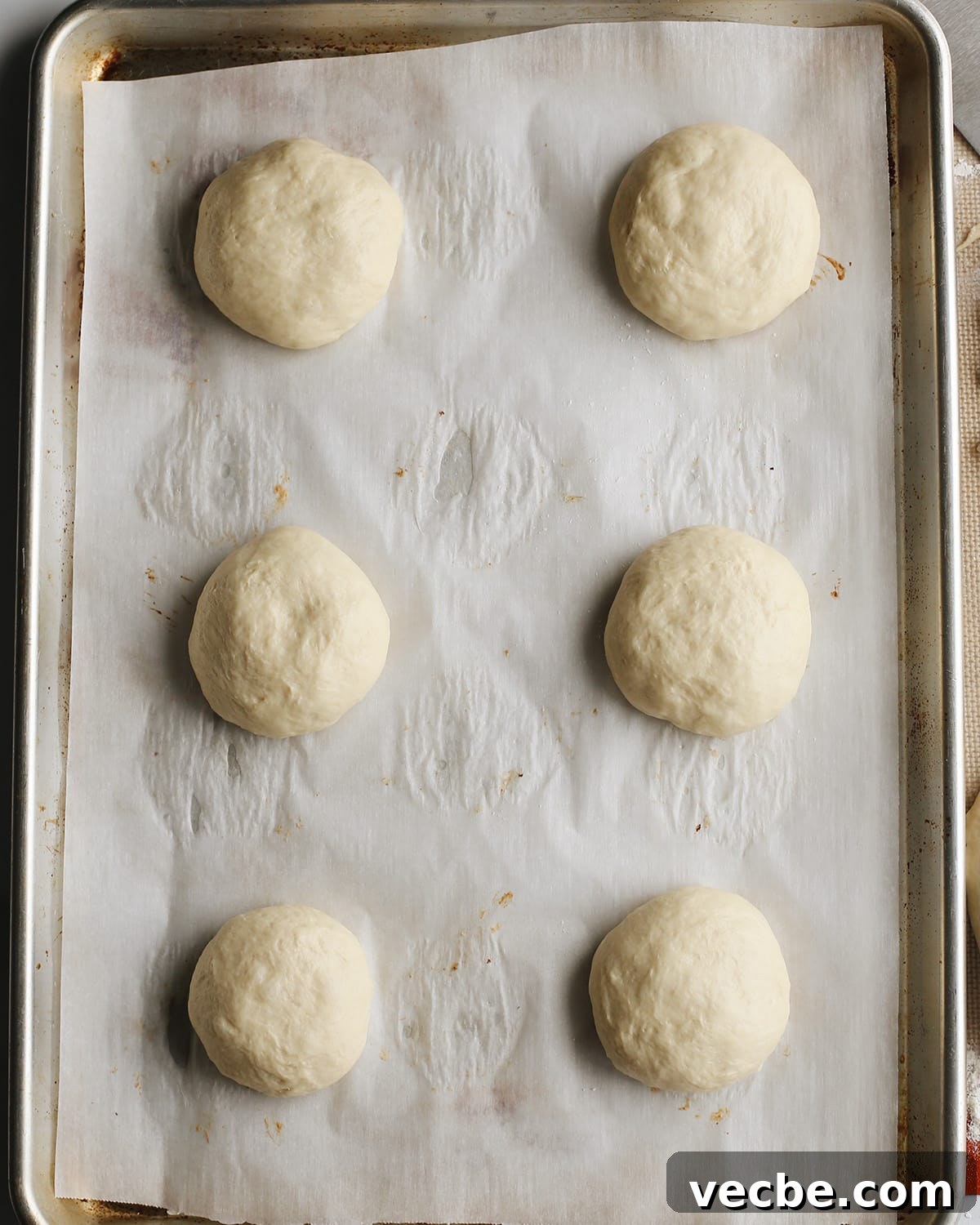 Homemade Hamburger Buns Recipe 3 How to Make Homemade Hamburger Buns - buns rising on baking sheet