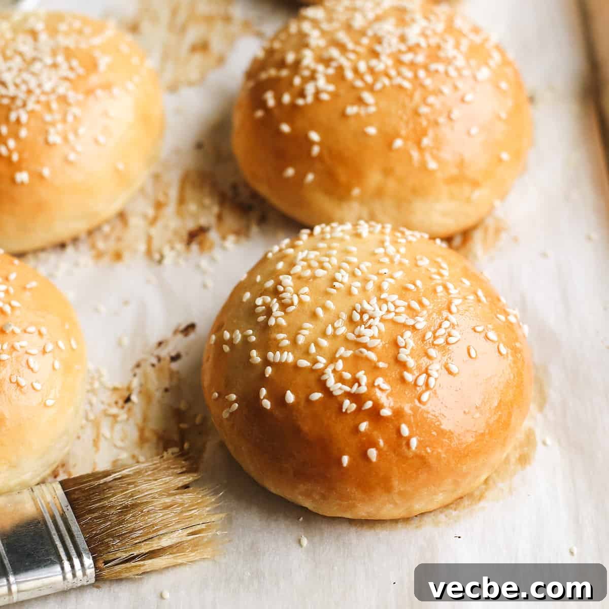 Homemade hamburger buns with a soft, buttery texture. front view of 4 Homemade Hamburger Buns (Burger Buns)