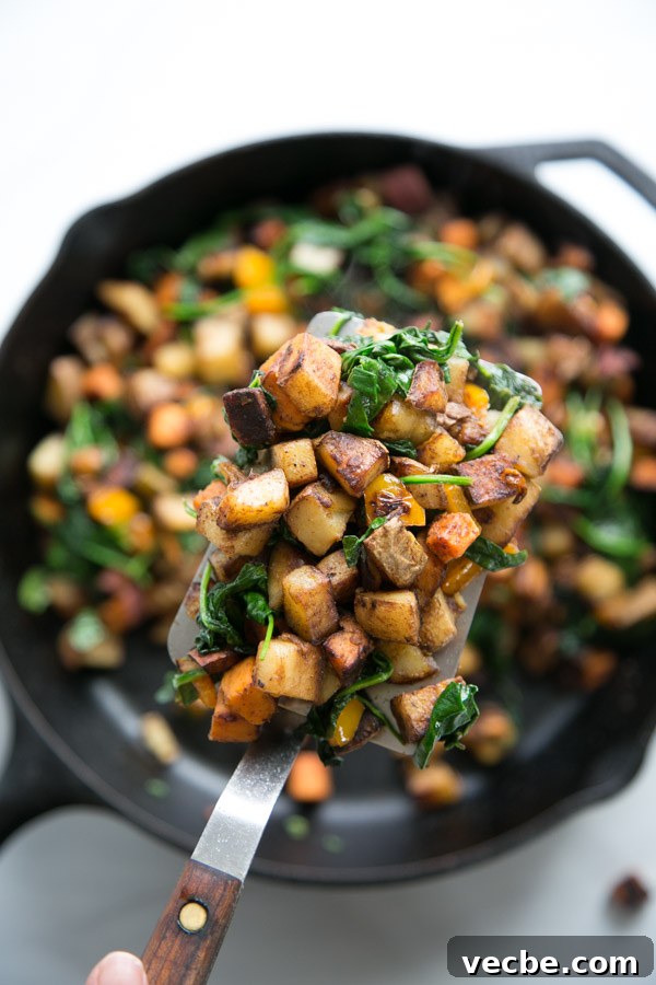 30-Minute Low FODMAP Breakfast Hash Recipe 11 spatula holding dairy-free low fodmap vegetarian breakfast hash