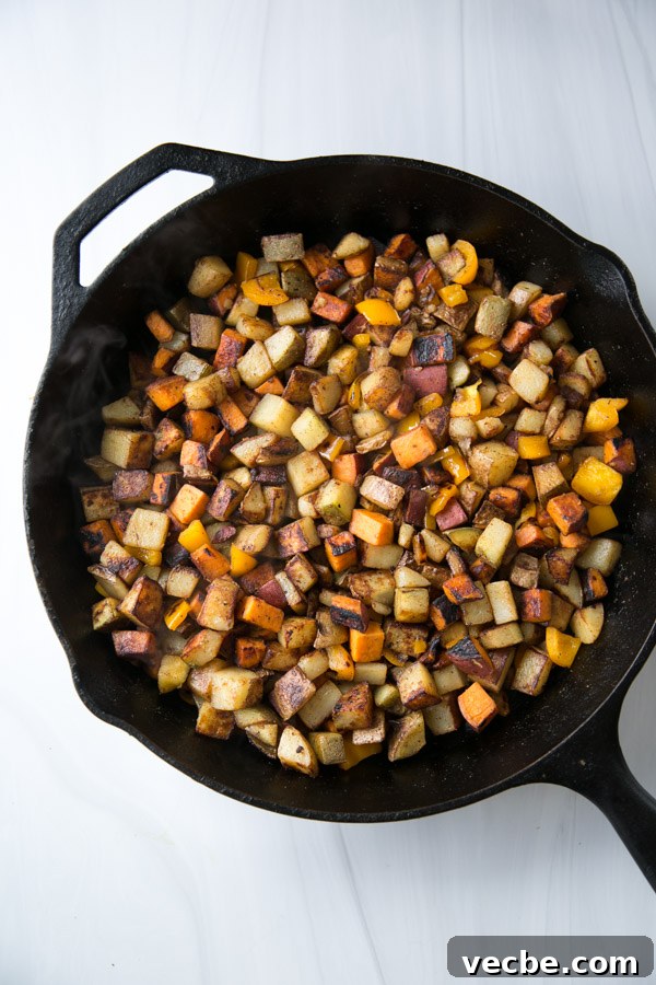 30-Minute Low FODMAP Breakfast Hash Recipe 8 skillet with low fodmap vegan breakfast hash potatoes - regular and sweet potato cooked stovetop
