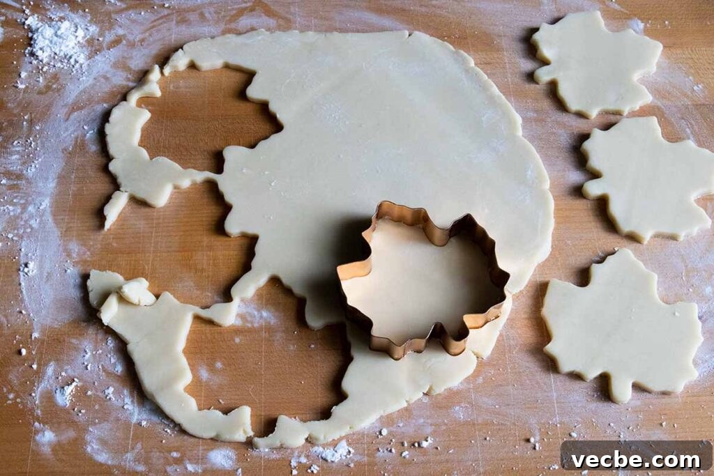 Maple Glazed Shortbread Cookies Recipe 4 cookie dough cut out on a wooden board