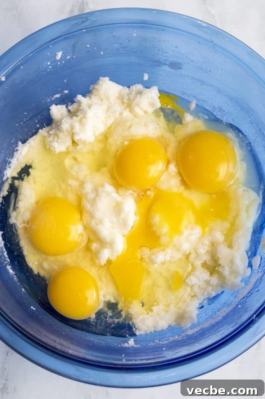 Italian Cream Cake Recipe with Pecan Cream Cheese Frosting 5 Add eggs to sugar mixture.