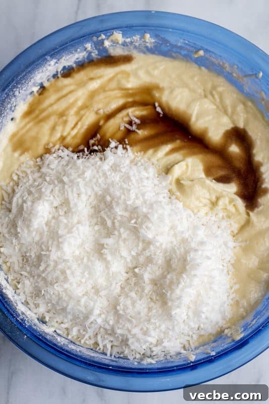 Italian Cream Cake Recipe with Pecan Cream Cheese Frosting 9 Add in coconut and vanilla and mix well.