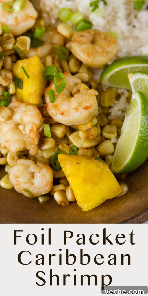 Caribbean Shrimp Foil Packets with Pineapple and Peppers 6 close up on shrimp, corn, and pineapple with lime wedges served over coconut rice. Title on lower portion: Foil Packet Caribbean Shrimp