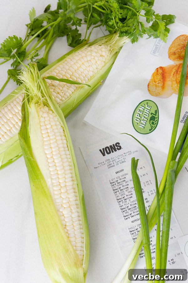 Caribbean Shrimp Foil Packets with Pineapple and Peppers 10 fresh ears of corn, a Vons receipt, a bag of Open Nature Seafood, and some green onions