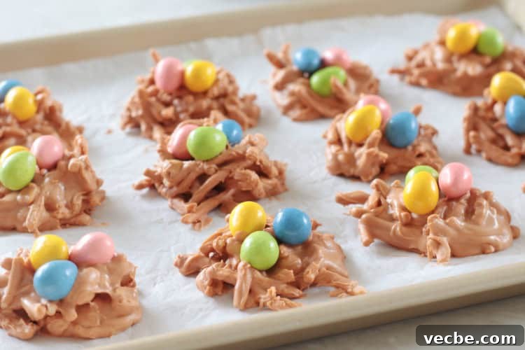 25 Irresistible Easter Dessert Recipes to Try 13 butterscotch birds nest cookies on cookie sheet
