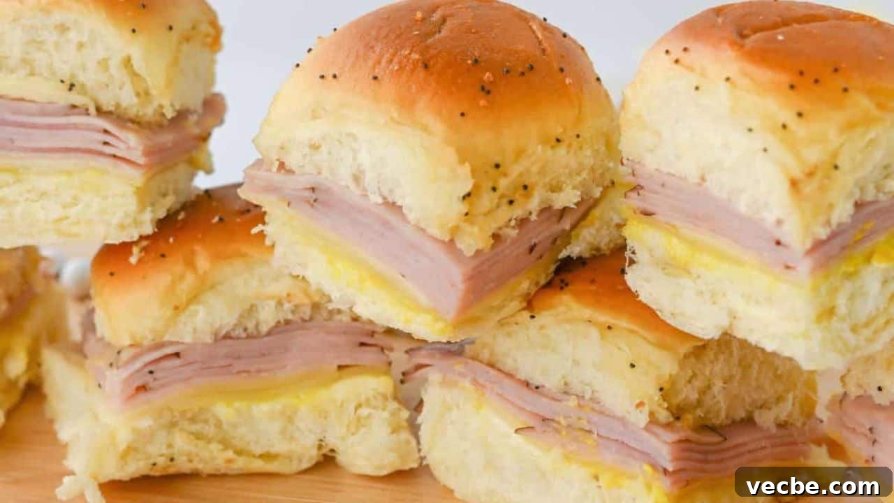 19 Irresistible Game Day Recipes That Melt in Your Mouth 15 Ham and Cheese Sliders on Hawaiian Rolls