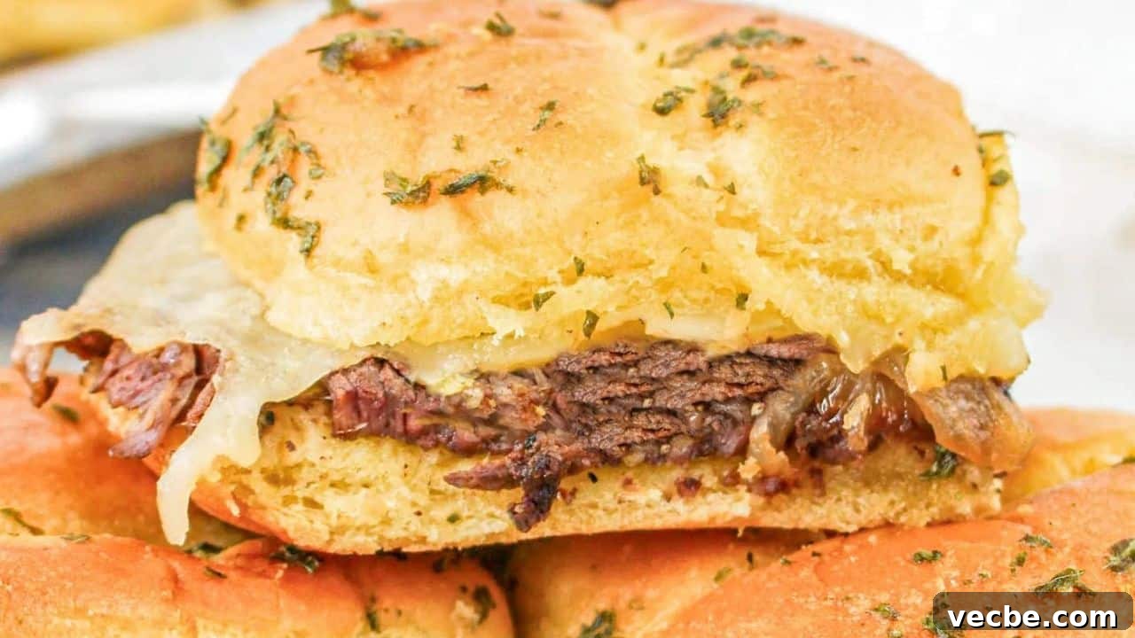 19 Irresistible Game Day Recipes That Melt in Your Mouth 4 Steak and Cheese Sliders