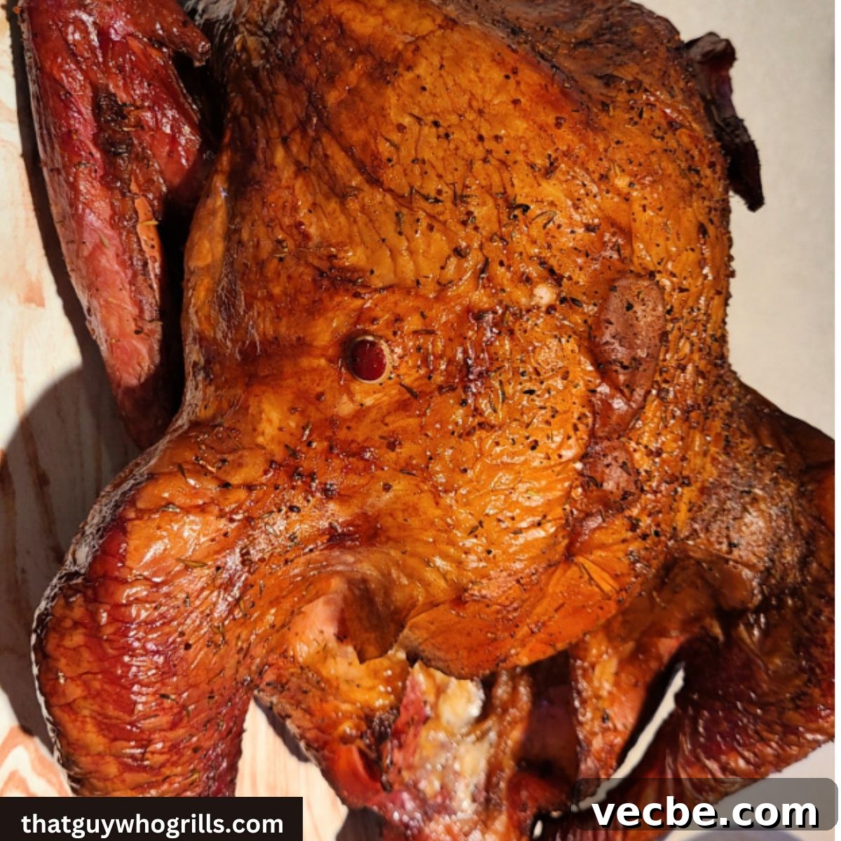 Bourbon Turkey Brine for Smoked Turkey with Jim Beam Apple 2 Smoked Bourbon Brined Turkey Cooked on a platter