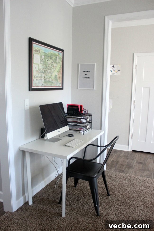 DIY IKEA Built In Storage Cabinets on a Budget 11 Small home office area beside IKEA built-in storage wall