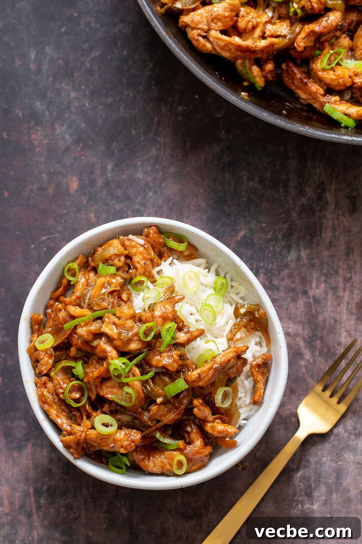 Vegan Chilli Chicken with Soy Curls Recipe 2 vegan chili chicken served with a fork on the side