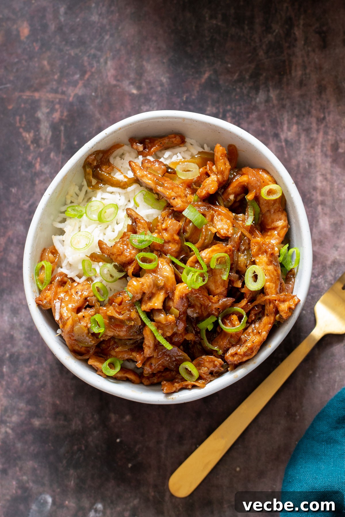 Vegan Chilli Chicken with Soy Curls Recipe 15 a plate of vegan Indo Chinese chilli chicken served over rice