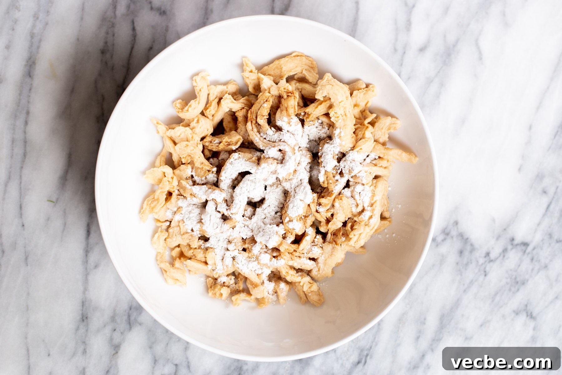 Vegan Chilli Chicken with Soy Curls Recipe 6 soaked vegan soycurls in a white plate