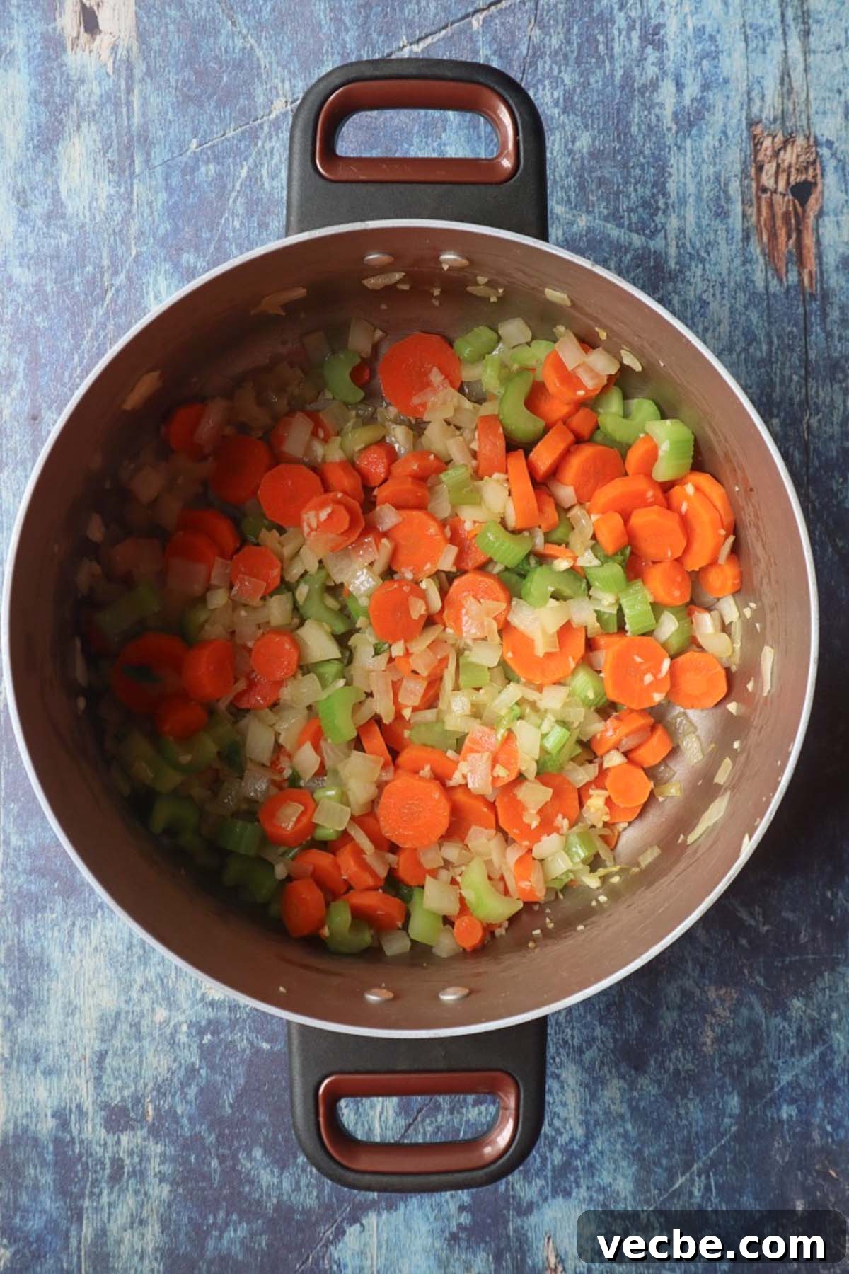 Creamy Vegan Chickpea Broccoli Soup 4 pot with sauteed carrot, celery, onion, and garlic