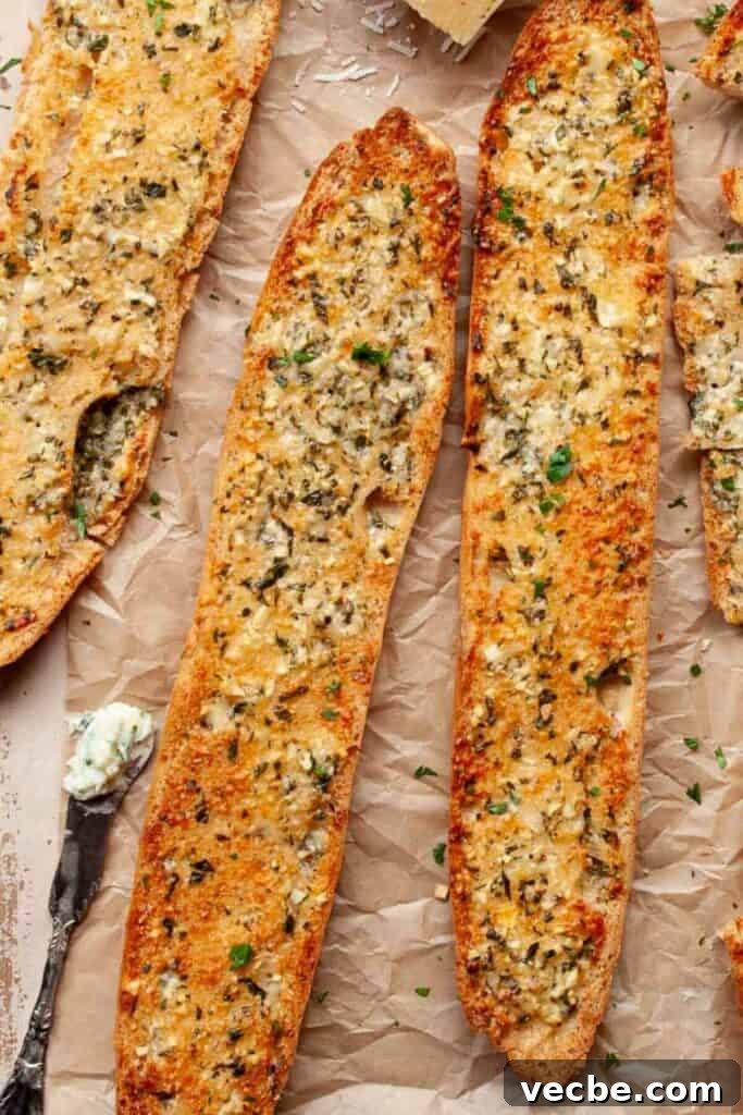 Gluten-Free Garlic Bread Recipe with Crispy Edges 11 close up of golden crispy gluten-free garlic bread