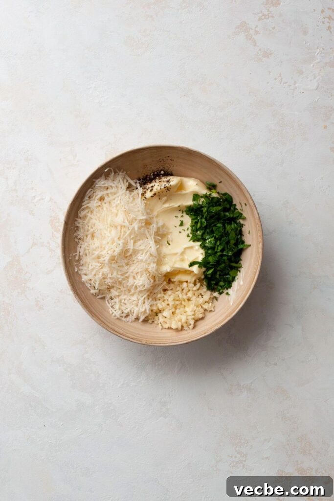 Gluten-Free Garlic Bread Recipe with Crispy Edges 5 garlic butter spread ingredients in a bowl