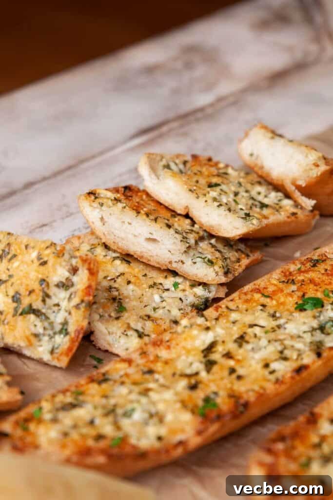 Gluten-Free Garlic Bread Recipe with Crispy Edges 8 side view of gluten-free garlic bread