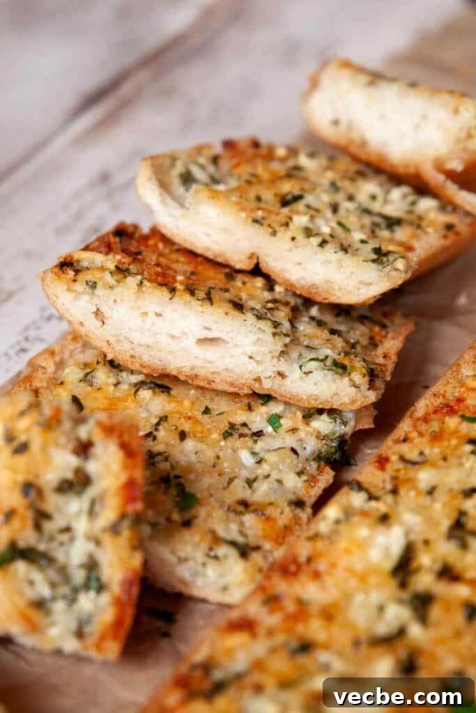 Gluten-Free Garlic Bread Recipe with Crispy Edges 10 buttery gluten-free garlic bread with crispy parmesan top