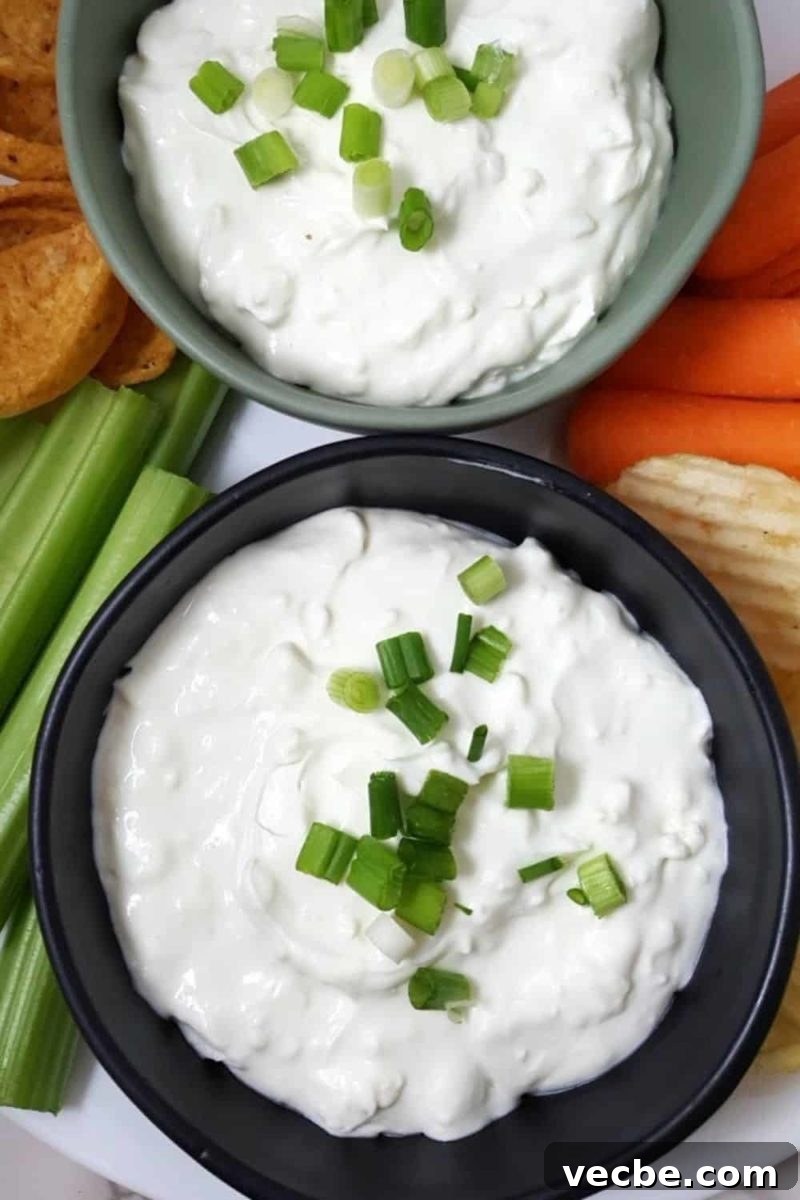 Creamy 4-Ingredient Beer Cheese Dip Recipe 2 two bowls filled with 4 Ingredient Beer Cheese Dip.