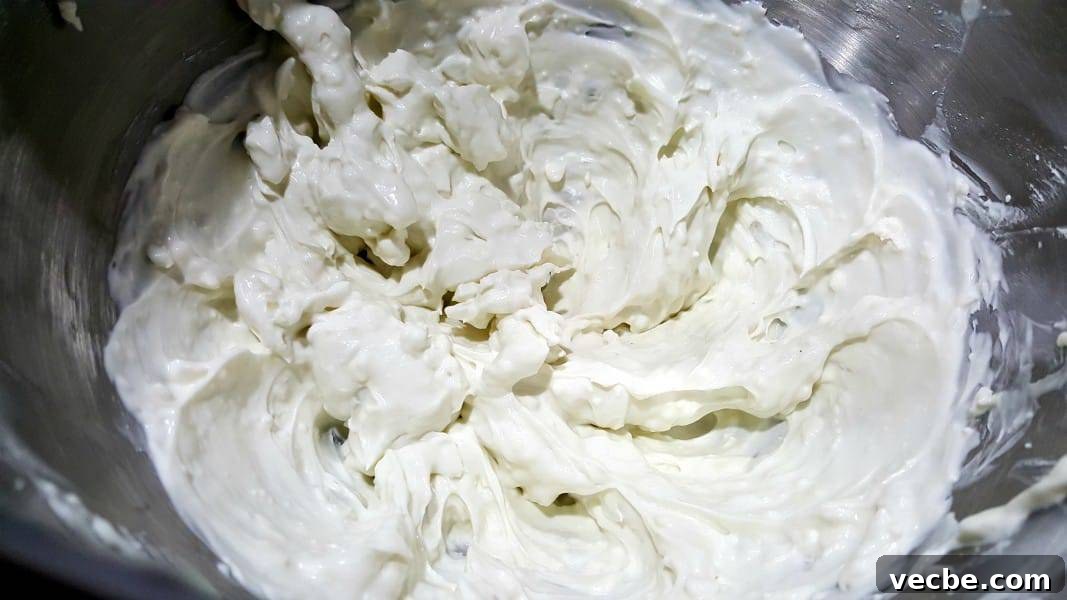 Creamy 4-Ingredient Beer Cheese Dip Recipe 4 Guinness Cheese Dip dip mixed in a bowl.