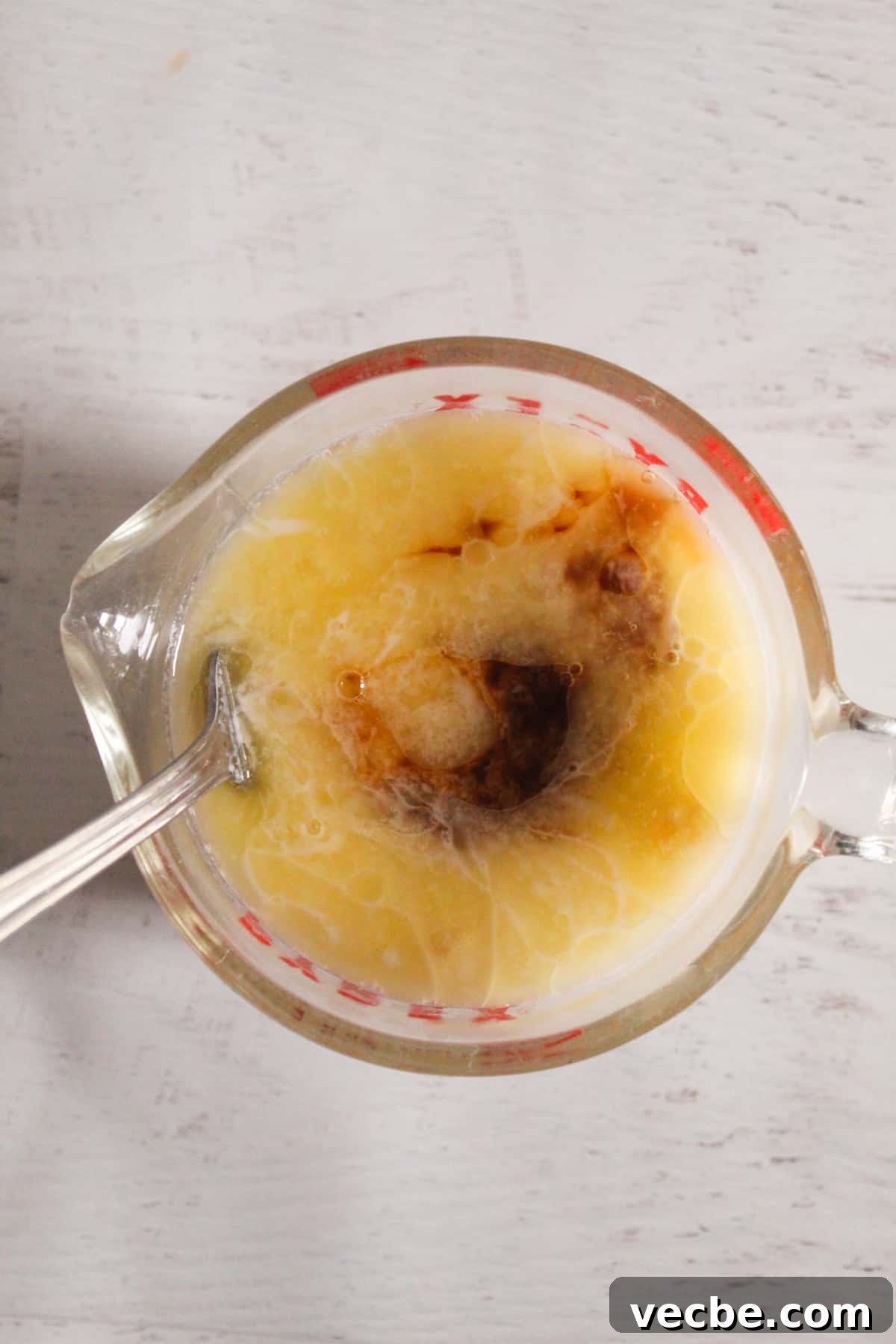 Fluffy Gluten-Free Buckwheat Pancakes Recipe 6 measuring cup full of wet ingredients for pancake batter