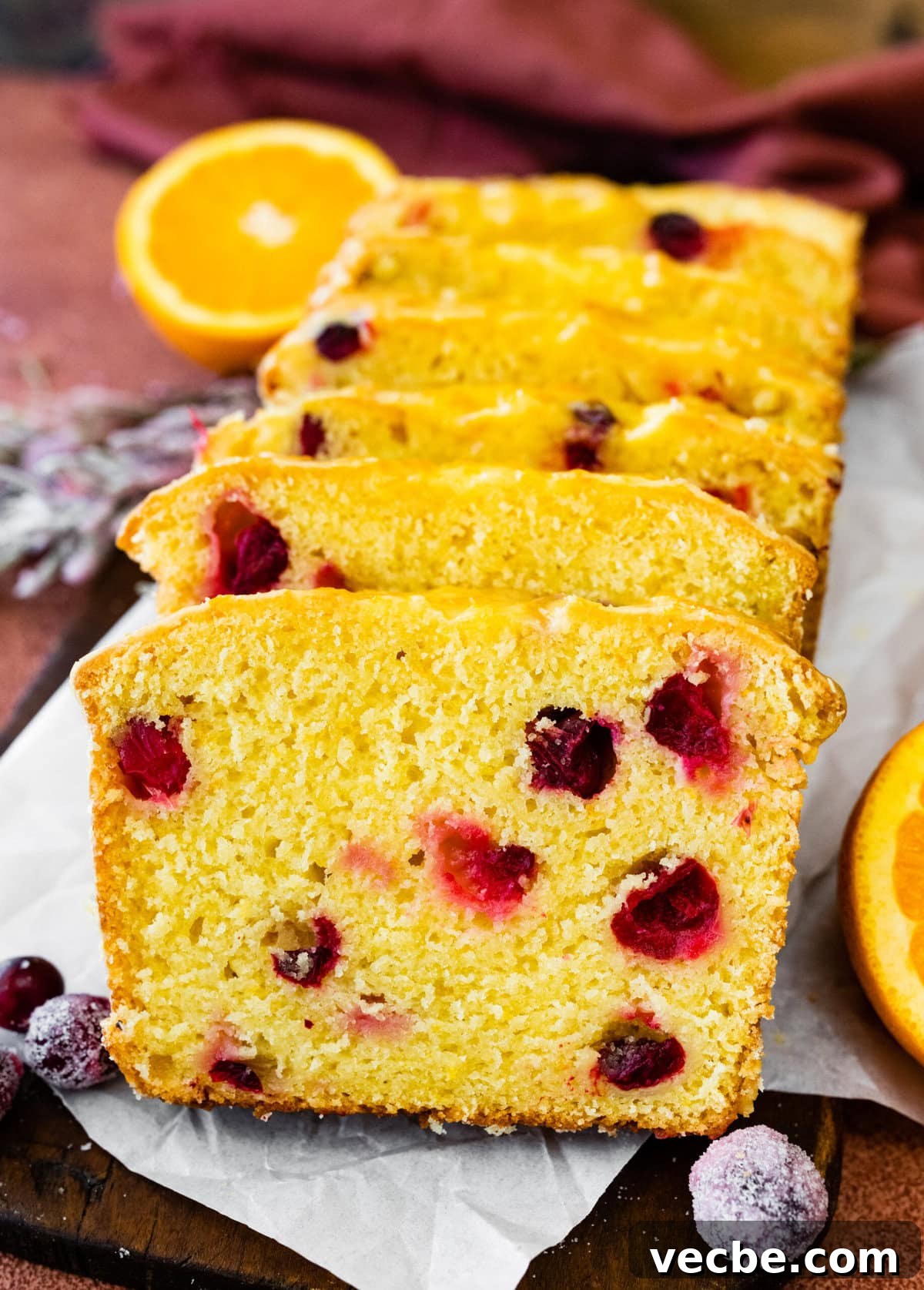 65+ Christmas Dessert Recipes Your Guests Will Love 19 Leaning slices of cranberry orange bread.
