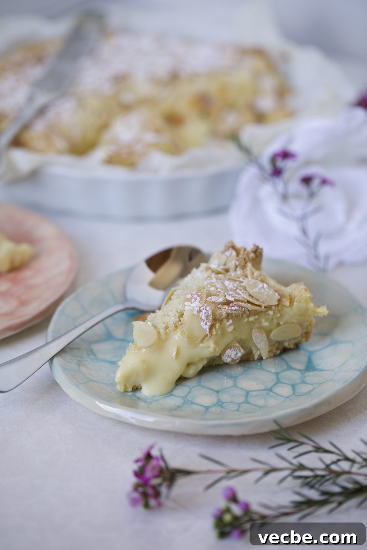65+ Christmas Dessert Recipes Your Guests Will Love 30 Italian Cake slice on a plate cream filling oozing out of slice