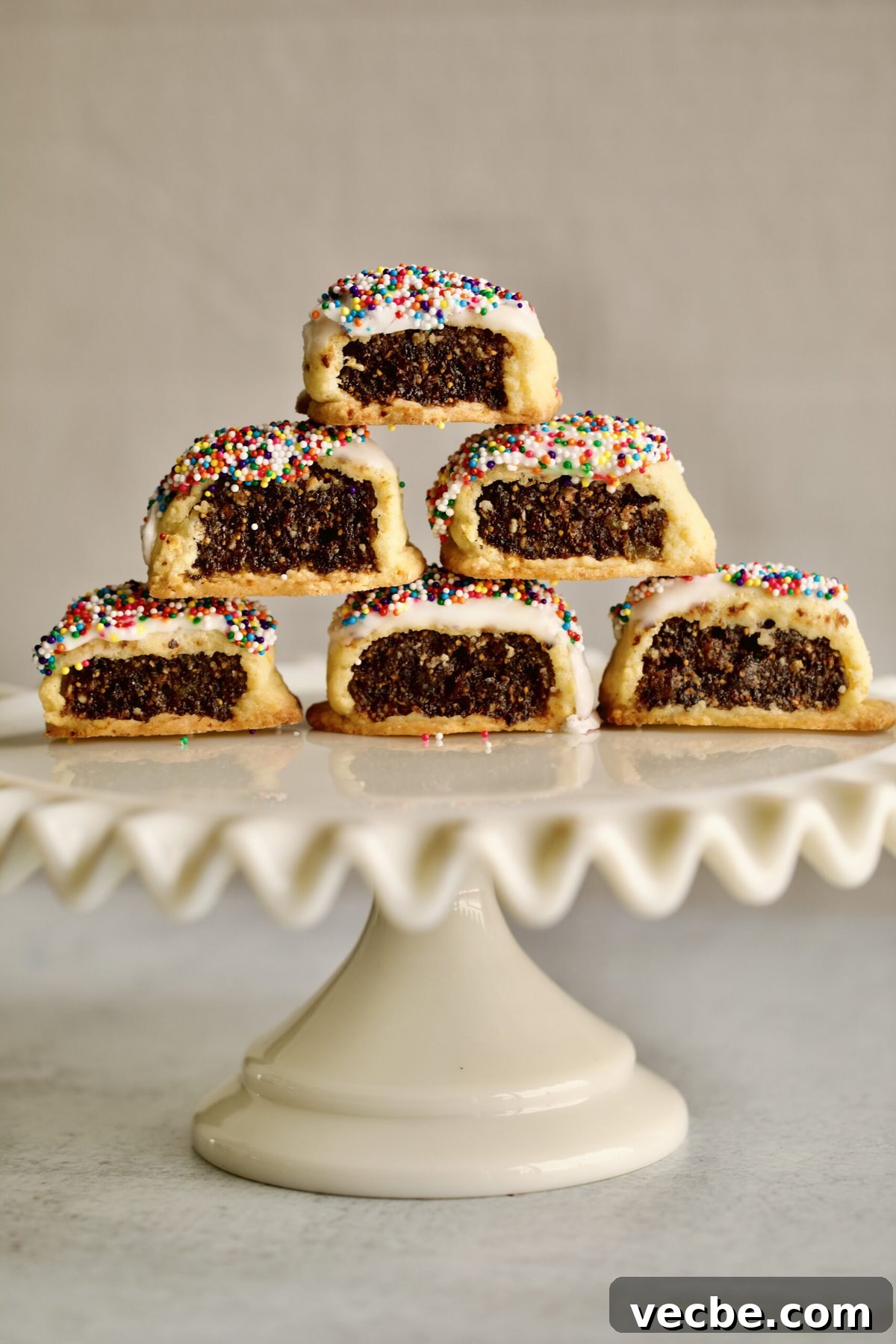 65+ Christmas Dessert Recipes Your Guests Will Love 6 cucidati cookies on a ruffled cookie platter
