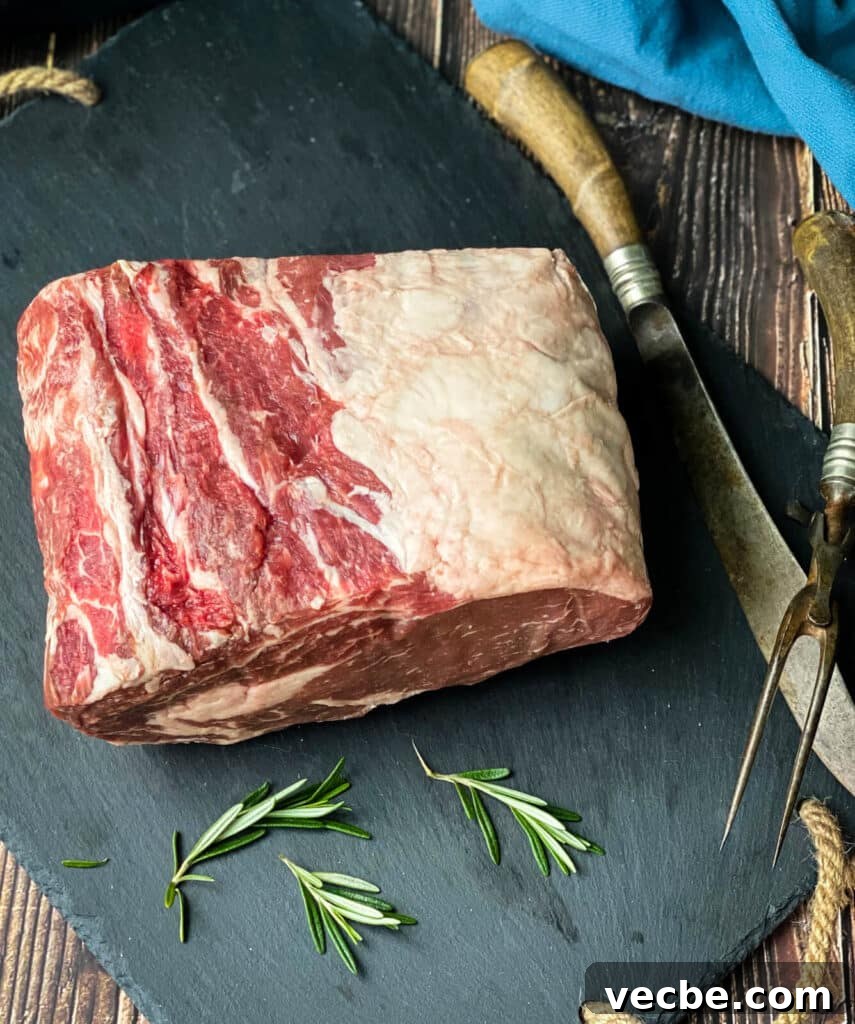 How to Smoke and Sear Prime Rib Roast 3 uncooked prime rib on a cutting board